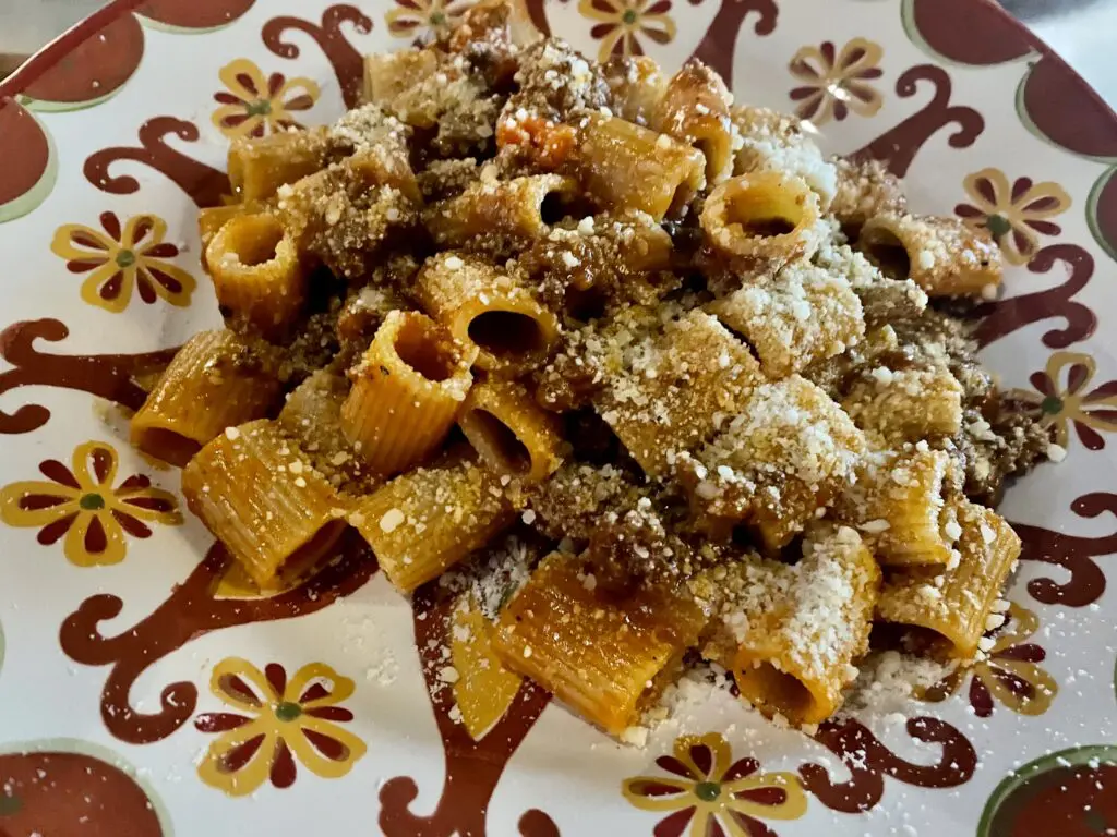 Rich rigatoni Bolognese is just the kind of simple recipes that spell authentic meals. (Photo by Courtney Dabney)