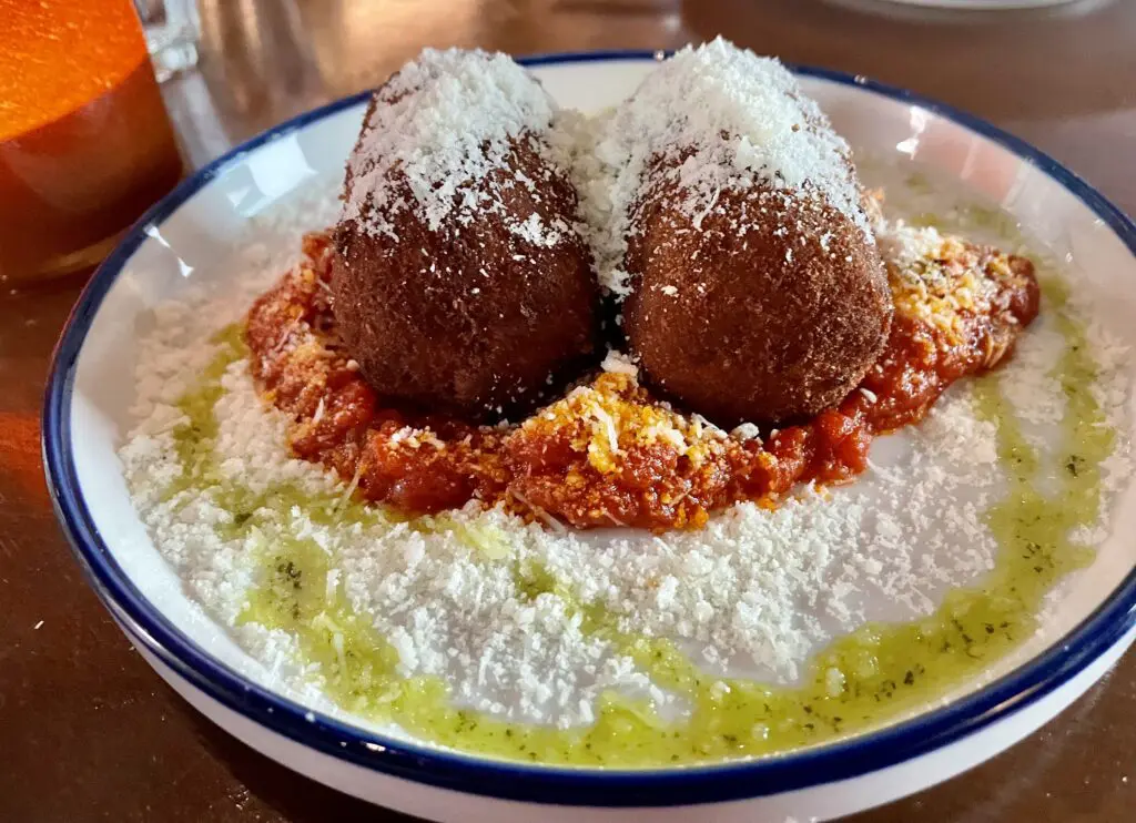 Suppli Al Telefono ― two crispy tomato risotto logs. (Photo by Courtney Dabney)