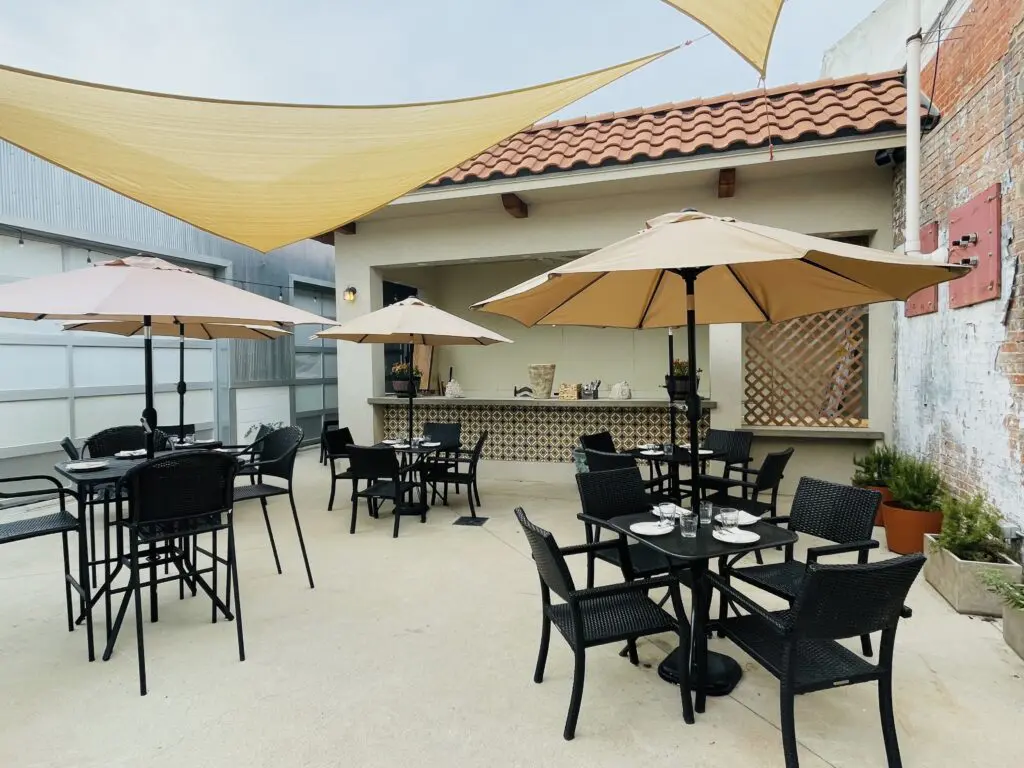 The charming patio at Bocca Osteria Romana is ready for shoulder season dining. (Photo by Courtney Dabney)