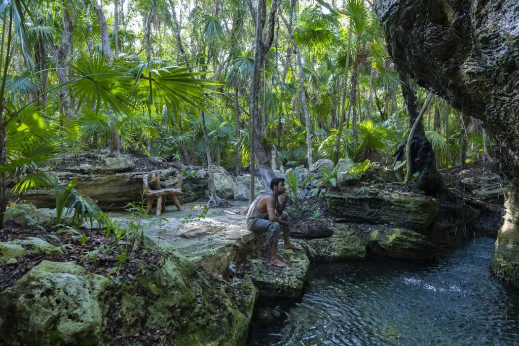 Beautiful natural freshwater springs, called cenotes, are scattered throughout the property, offering the perfect spot for a dip or a peaceful view of a serene waterfall. (Photo courtesy Palmaïa-The House of Aïa) 