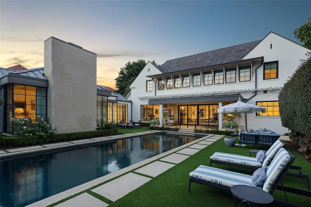 The covered porch and manicured pool lounge area at 3509 Crescent Avenue showcase the home's entertaining options.