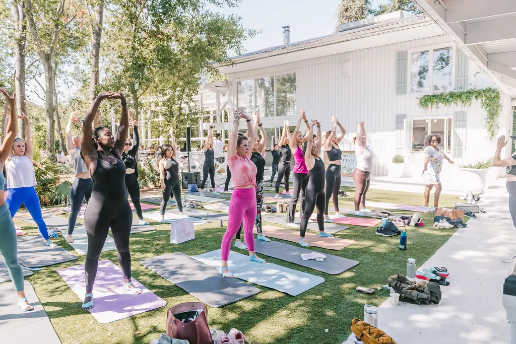 Attendees exercise their bodies and minds during mat pilates and wellness chats at PaperCity's Nourish retreat. (Photo by Heather Robards)