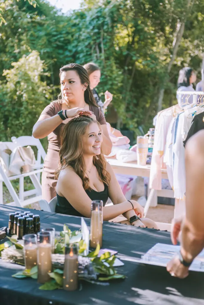 Volume Social's Gabby Camacho created intricate braids for attendees at PaperCity's Nourish retreat. (Photo by Heather Robards)