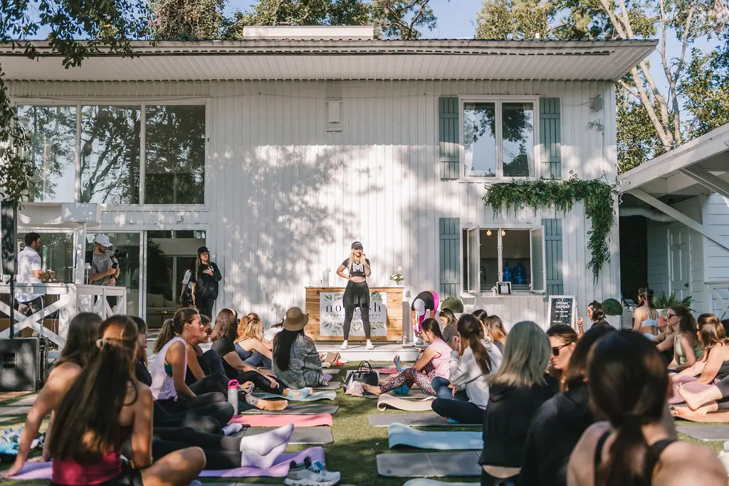 Method Pilates founder Ashton Verrengia guides attendees through an amped mat pilates routine at PaperCity's Nourish retreat. (Photo by Heather Robards)