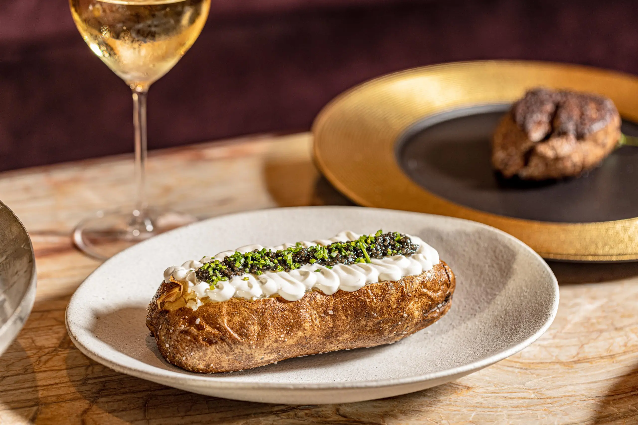 Everything is taken up a notch at Nuri as the sea salt baked potato is gigantic and comes topped with a large portion of caviar. (Photo by Kayla Enright)