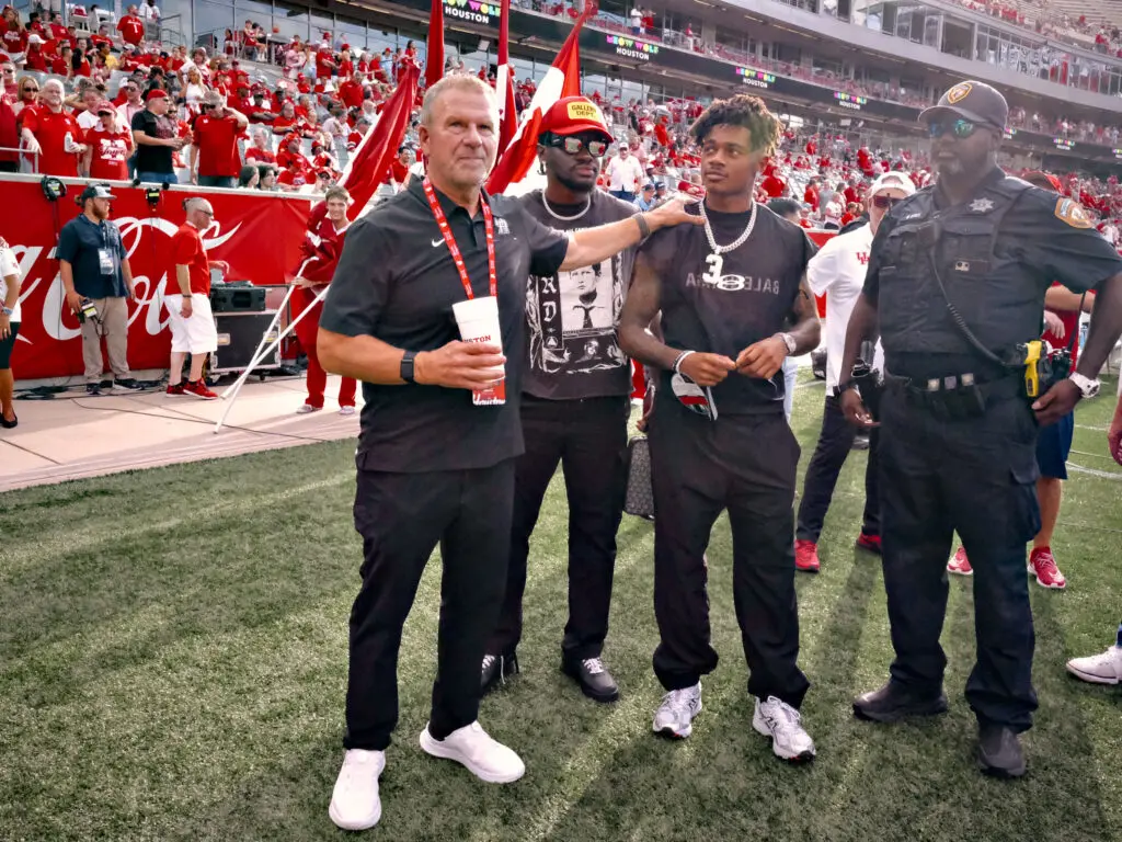 Tilman Fertitta knows that Tank Dell has the right kind of Cougar swagger. (Photo by F. Carter Smith)