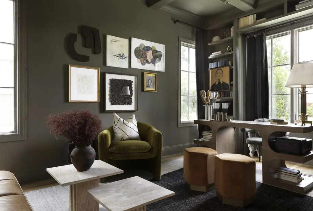 This Urbanology Designs project's spaces are encased in an elegant crown molding and are home to not one, but two, hidden door passageways — making for a unique and intriguing layout. 