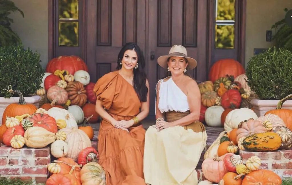 West Fork Garden Market's Alyssa Petrus and Christine Figley pose amidst one of their fabulous seasonal door displays.