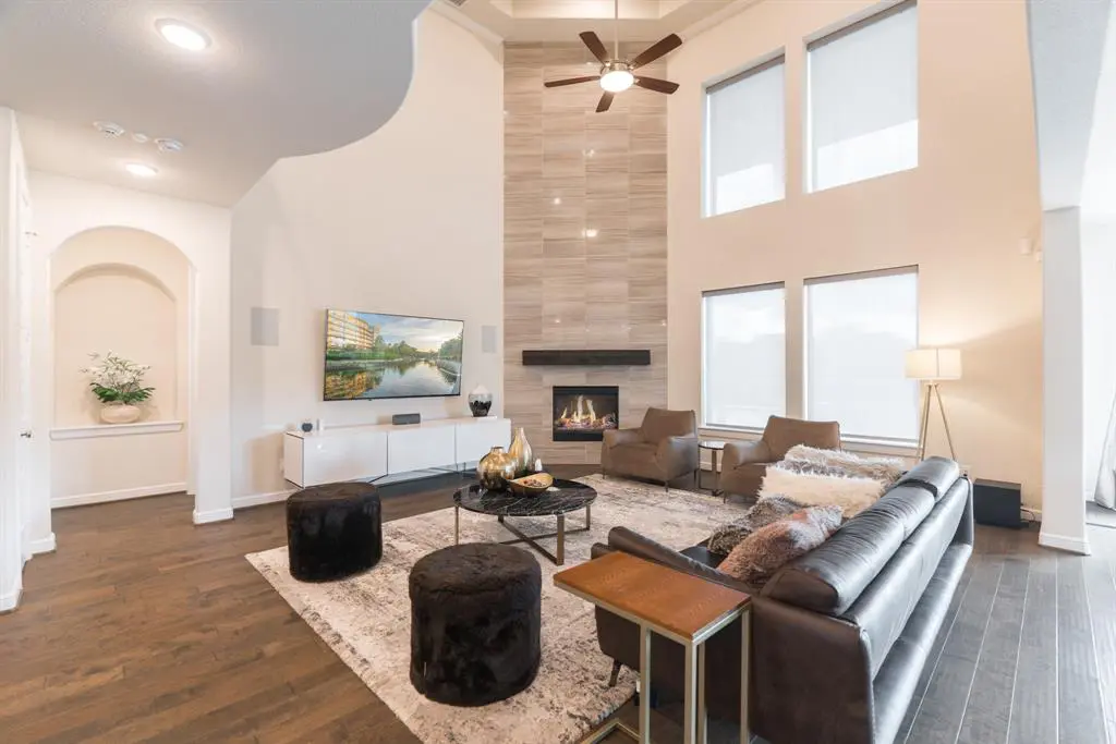 The tall ceilings inside the home allow for plenty of natural sunlight to brighten the living space. 