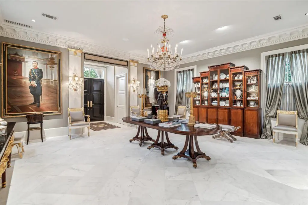 The marble floors in the grand reception and dining room of the Federal-style home at 6024 Memorial Drive in Glen Cove glisten