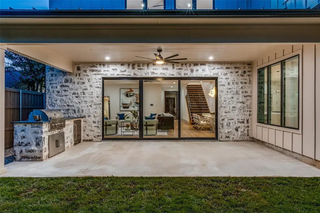 The backyard features a concrete patio.