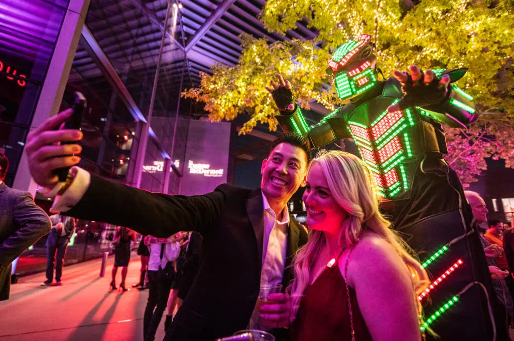 Elle Congeliere and Steven Bui Pose with LED Robot (Photo by Can Turkyilmaz)