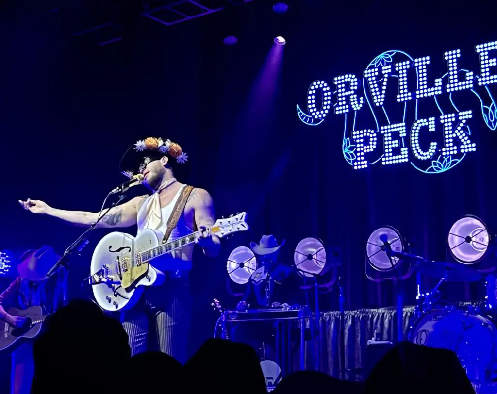 Fans were so close to the folksy, brokenhearted singer, one attendee joked Orville Peck might see him from the crowd and fall in love with him at House of Blues Houston.