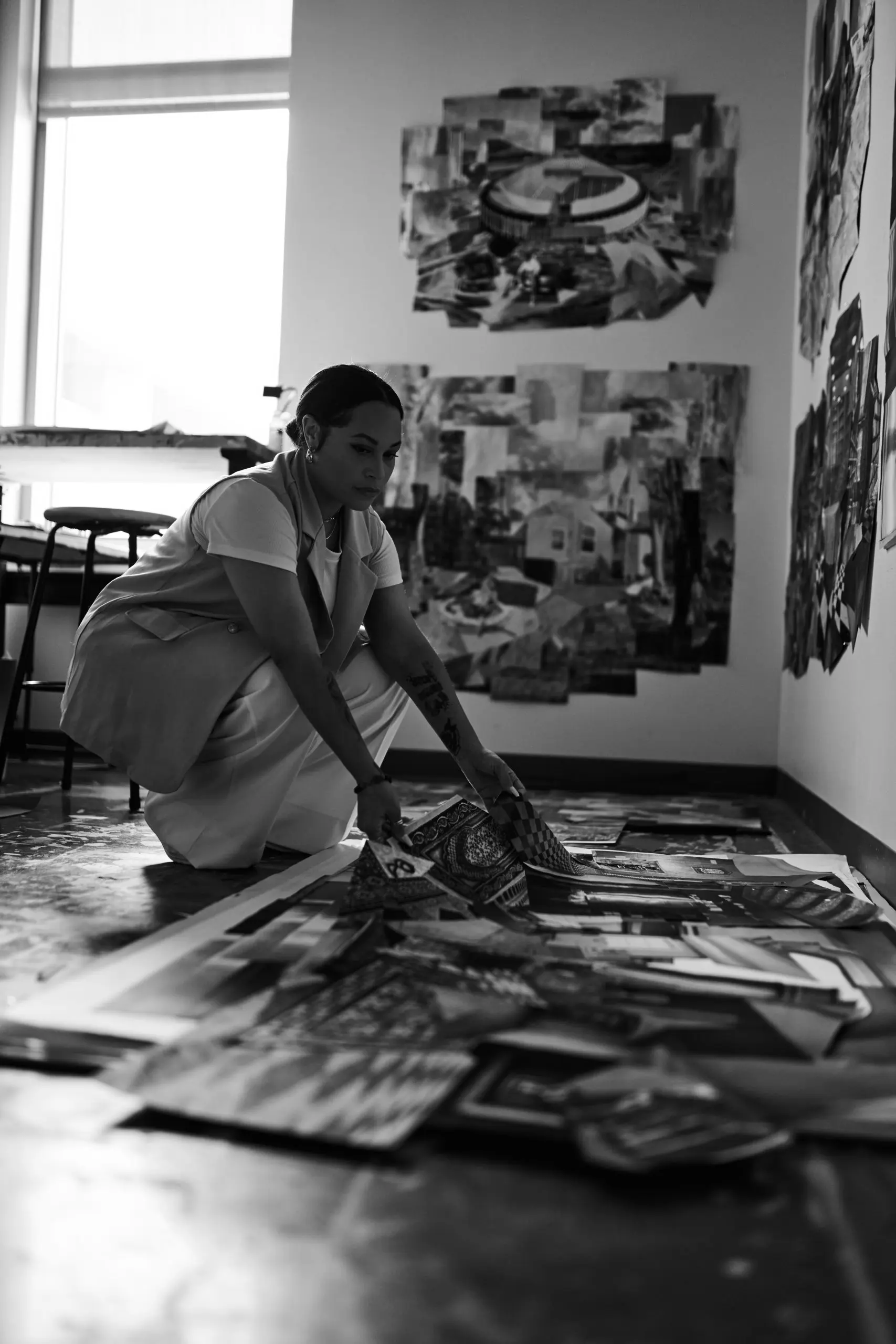 Artist Kaima Marie Akarue works on collages in her studio. Her work is featured in two exhibits simultaneously: "From Federal to Hopetown" at The Anderson Center for the Arts and "For The Record" at Art Is Bond. (Photo by Christopher Martin with 126 Photography. Courtesy Kaima Marie Akarue.)