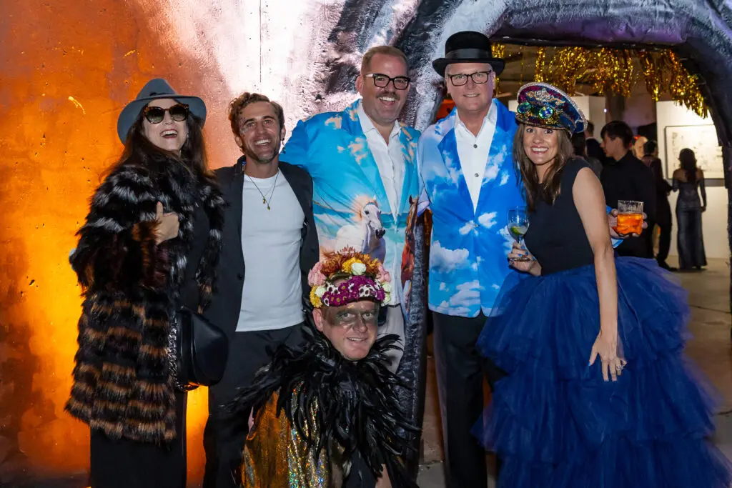Jaqueline Levine, Michael Mandola,  Scott Yoder (front), The Orange Show's Jonathan Beitler, Bob & Lane Schultz at the 2024 Orange Show Gala: DaliDada (Photo by Emily Jaschke) 