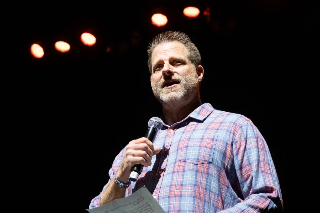 Jeff Young, the CEO for the Cynthia Woods Mitchell Pavilion welcomed the crowd to the Pavilion for the concert featuring Jack Ingram, Hayes Carll and Lyle Lovett and his Large Band on Friday, Oct. 18, 2024. (Photo by F. Carter Smith)