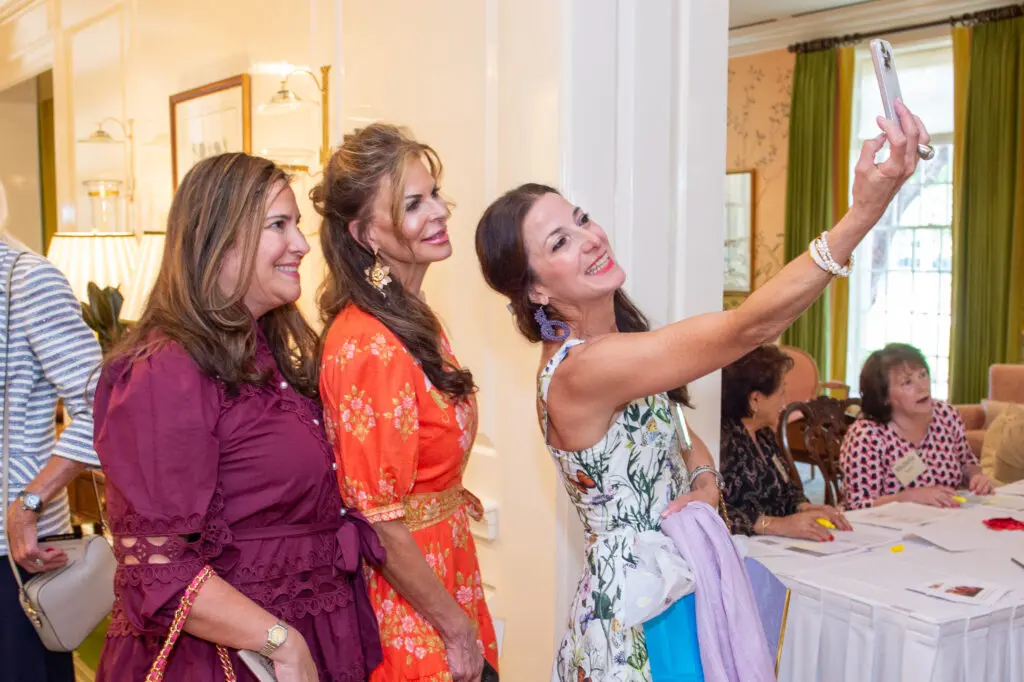 Saula Valente takes a selfie with Kelly Anzilotti and Jackie Smooke at Houston Symphony League Fall Membership Luncheon
