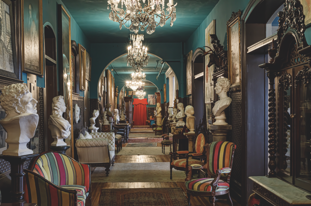 The second-floor hallway of Hunt Slonem's restored Watres Armory, Scranton, Pennsylvania. The vast 19th-century edifice testifies to Slonem's commitment to preservation. (Photo by John Neitzel)