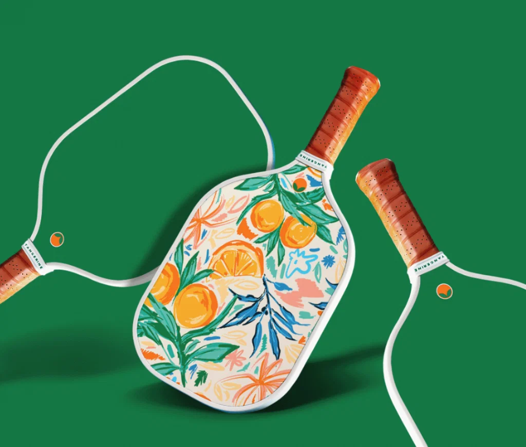 Tangerine's 'Kauai' picklebell racquet inspired by the lush forests of Kauai ($85) will have them looking as good as they play. 