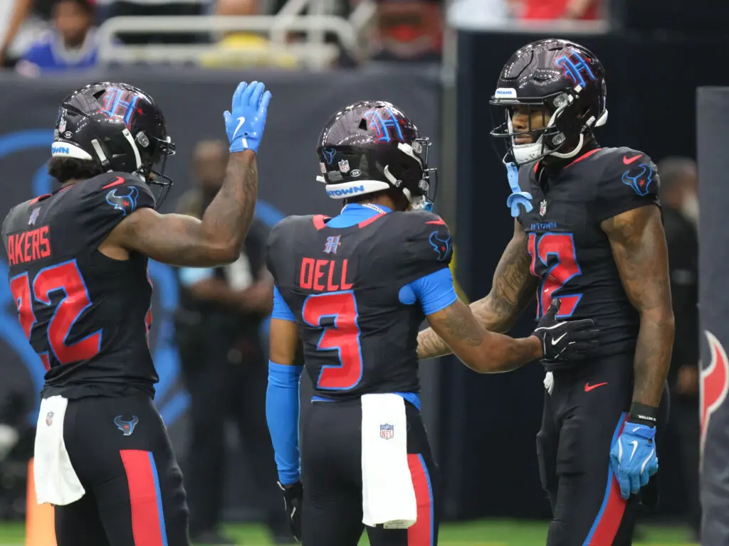 Nico Collins, Tank Dell and Stefon Diggs know how to celebrate big plays. (Photo by F. Carter Smith)
