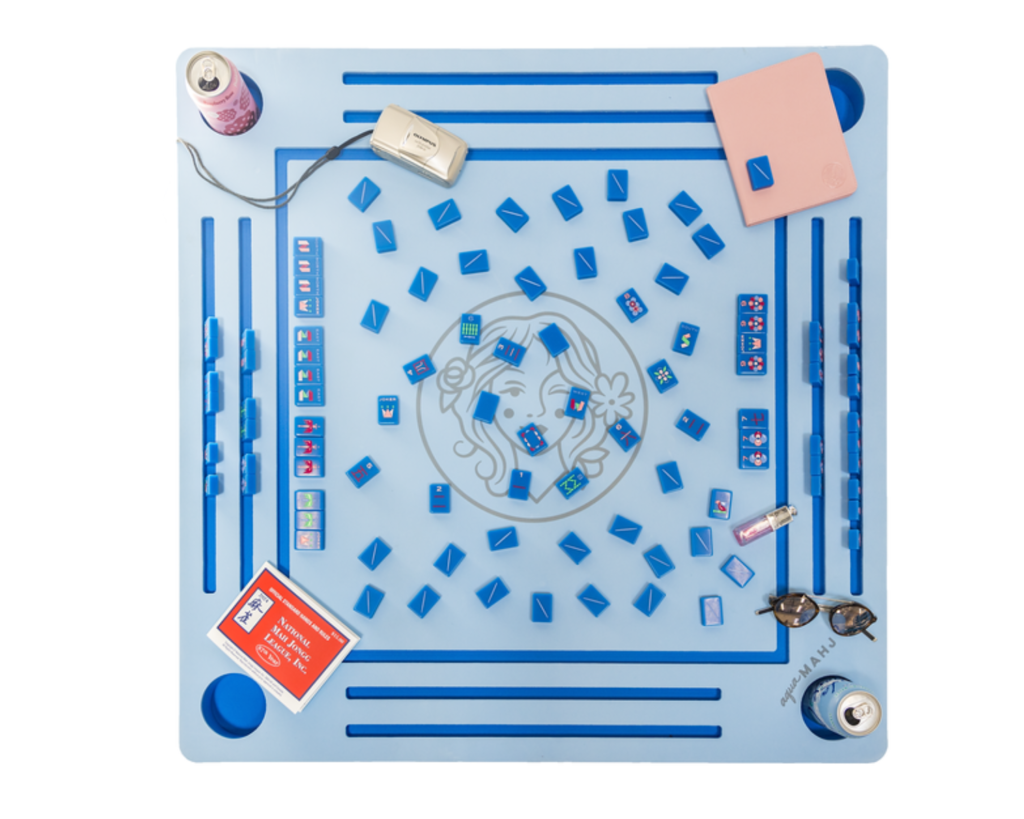 The Floating Mahjong Table adds fun to poolside gatherings with its waterproof design and vibrant style. (Photo courtesy The Mahjong Line)
