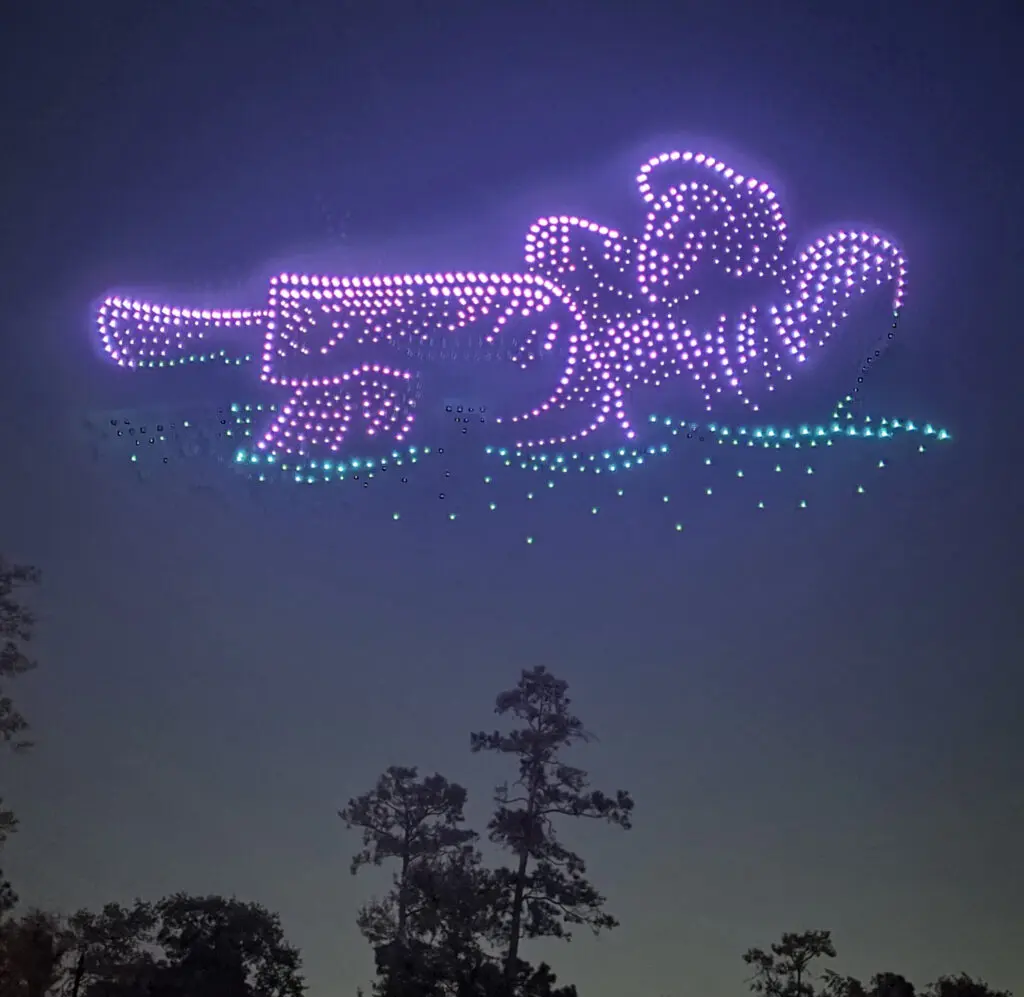 "The Dreamer" in drones at the fireworks and drone show at Northshore Park on Oct. 19.  "The Dreamer" sculpture was installed in Panther Creek in 1989. (Photo by Laura Landsbaum)