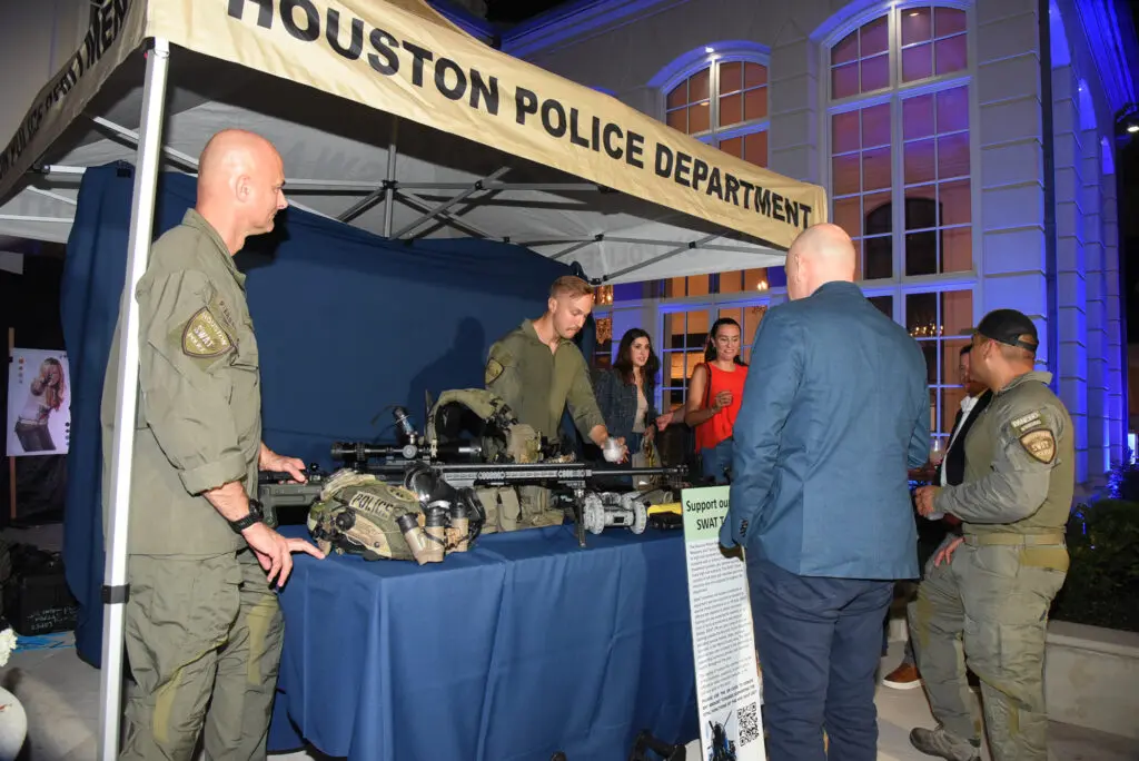 Police displays at the Tilman Fertitta Family home during the Houston Police Foundation True Blue fundraiser  (Photo by Alexander's Fine Portrait Design )