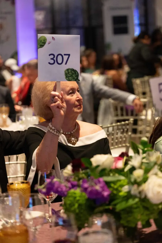 Generous bidding at March of Dimes Signature Chefs.  (Photo by Daniel Ortiz)