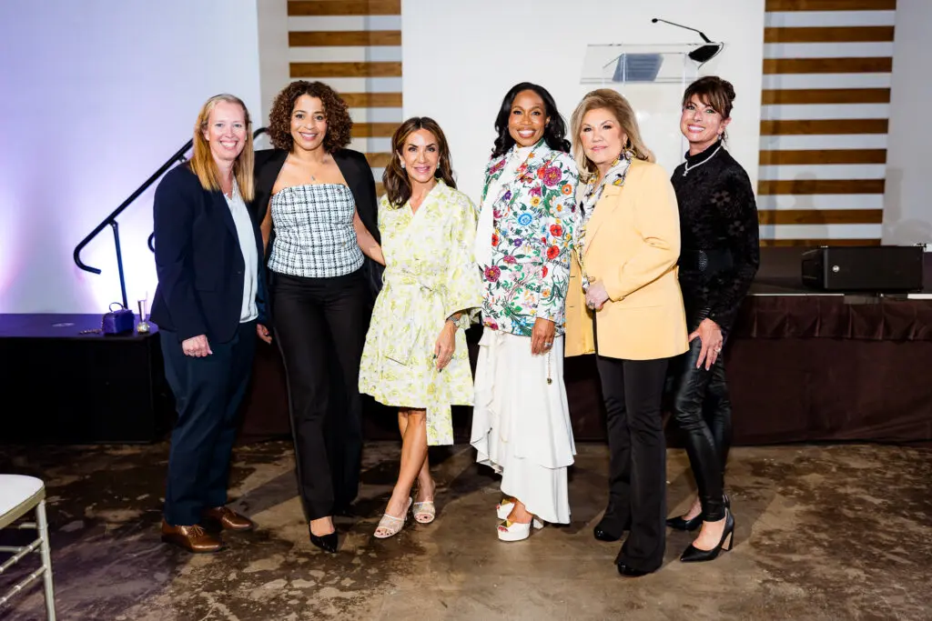 Deanna Mathieson, Laura Whitley, Courtney Zavala, Roslyn Bazzelle Mitchell, Edna Meyer-Nelson,Christine H. Johnson at the Power of the Purse fundraiser benefiting Women's Resource.
