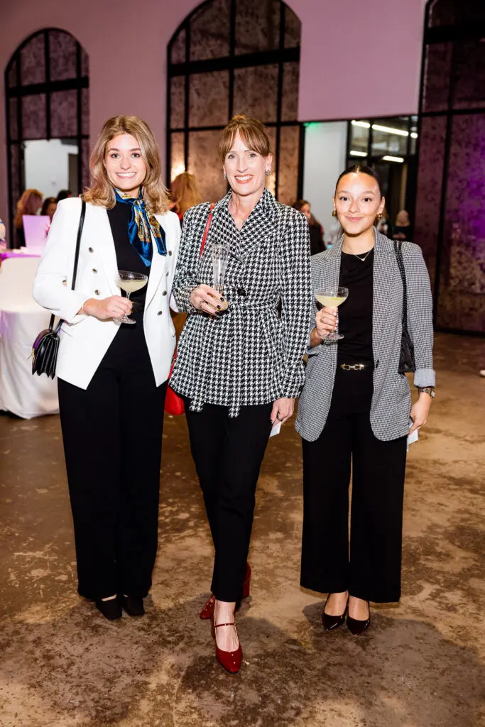 Mia Zugheri, Angelia Williams and Isabella McConahy at the Power of the Purse fundraiser benefiting Women's Resource.