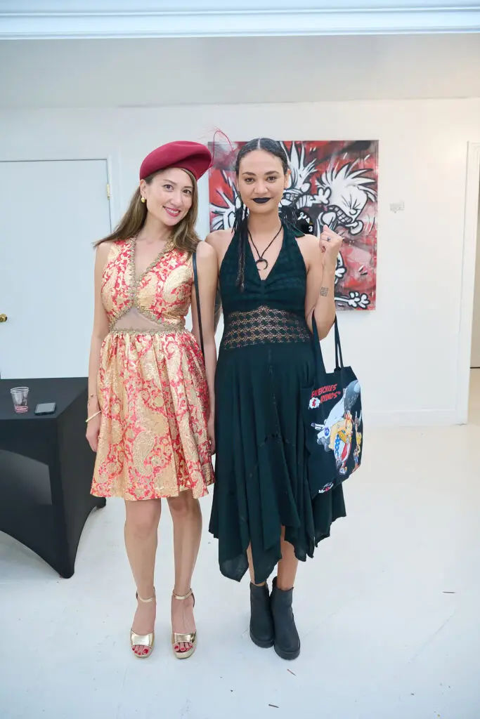 Karla Modesto, Krista Davenport at the "Frenchies & Friends" opening celebration at Alliance Française de Houston. (Photo by Charlie Horse Photography)