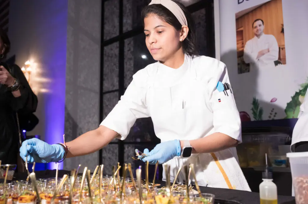 Serving at the Le Jardinier station during March of Dimes Signature Chefs. (Photo by Daniel Ortiz)