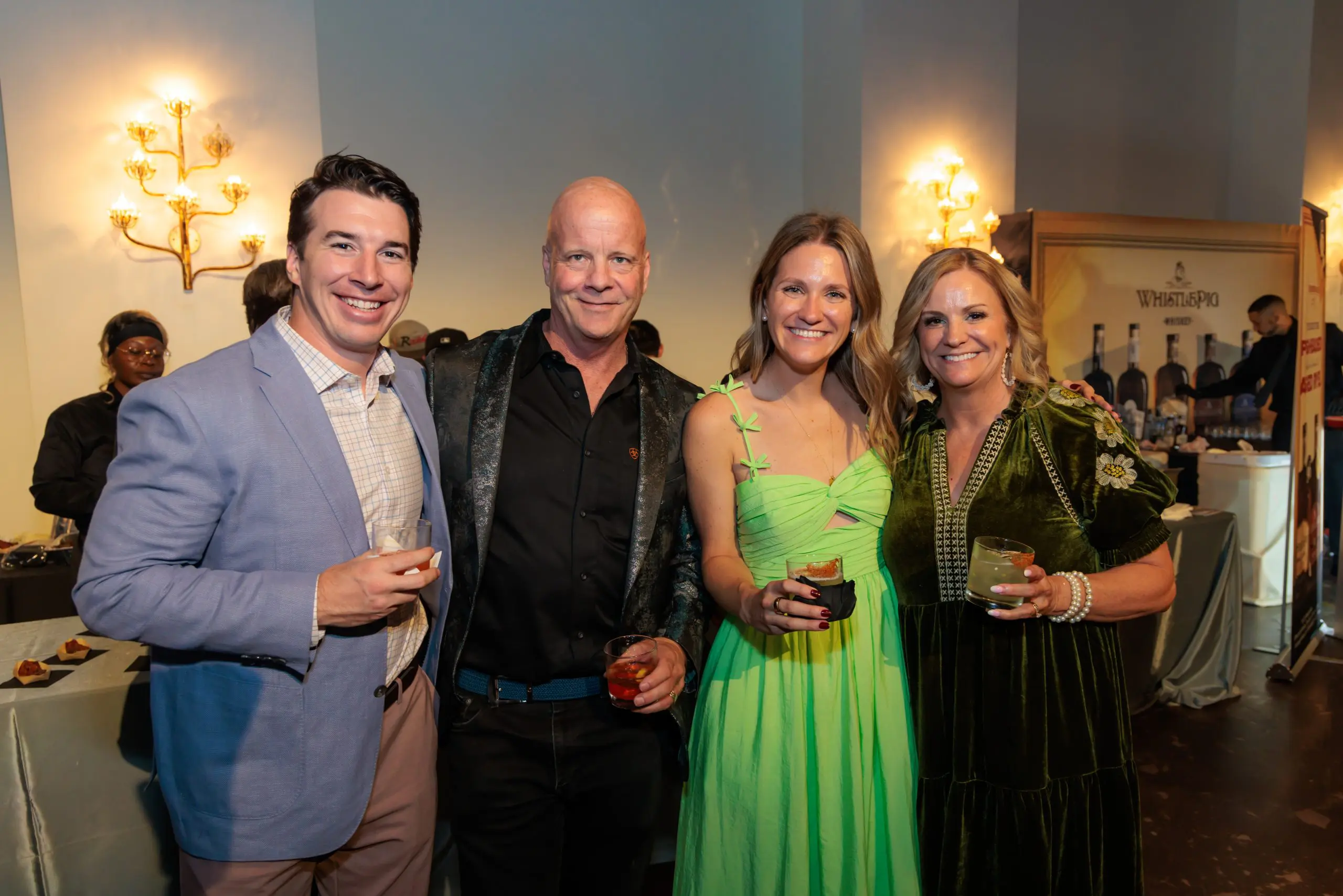 Luke Smith, Eric Shmauch, Jessica Smith, Mary Shmauch at the Dress for Success Houston gala