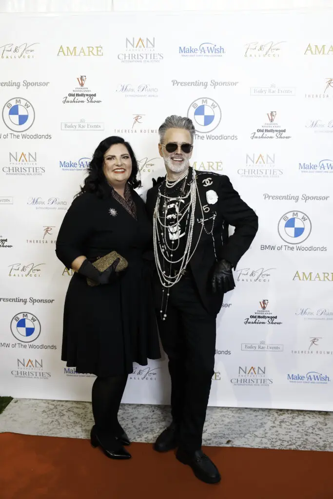 A Make-A-Wish official and emcee Michael Pearce at Fashion Woodlands in the home of Theresa Roemer.