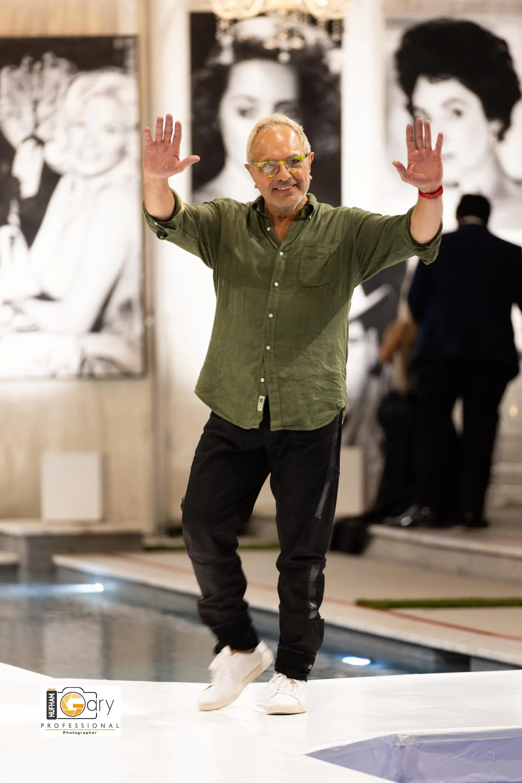 Designer Jose Sanchez walked the runway after his models at "Fashion Woodlands" at Theresa Roemer's home in The Woodlands.