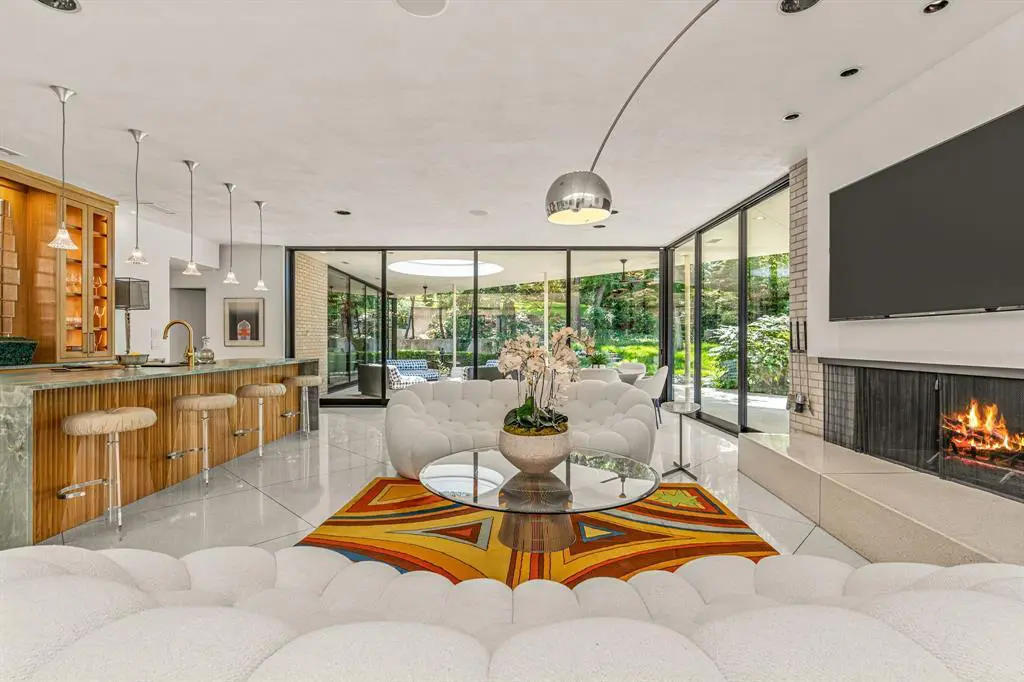 The $7,499,000 price tag for 2100 Indian Creek Drive also gets you a library, office, theater, wine cellar, and more.