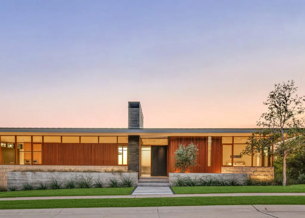 The bold geometric design of 3736 Aviemore Drive stands proudly on its hilltop perch, seamlessly blending modern lines with natural surroundings. (Courtesy)