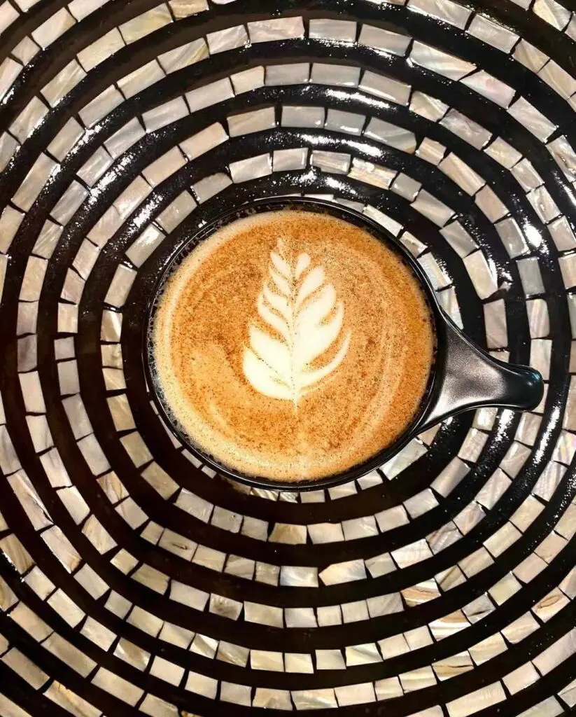 Hogan Alley, a shotgun-style coffee bar in Hell’s Half Acre, offers seasonal favorites like the Northside Latte, a bold twist on hot chocolate. (Courtesy)