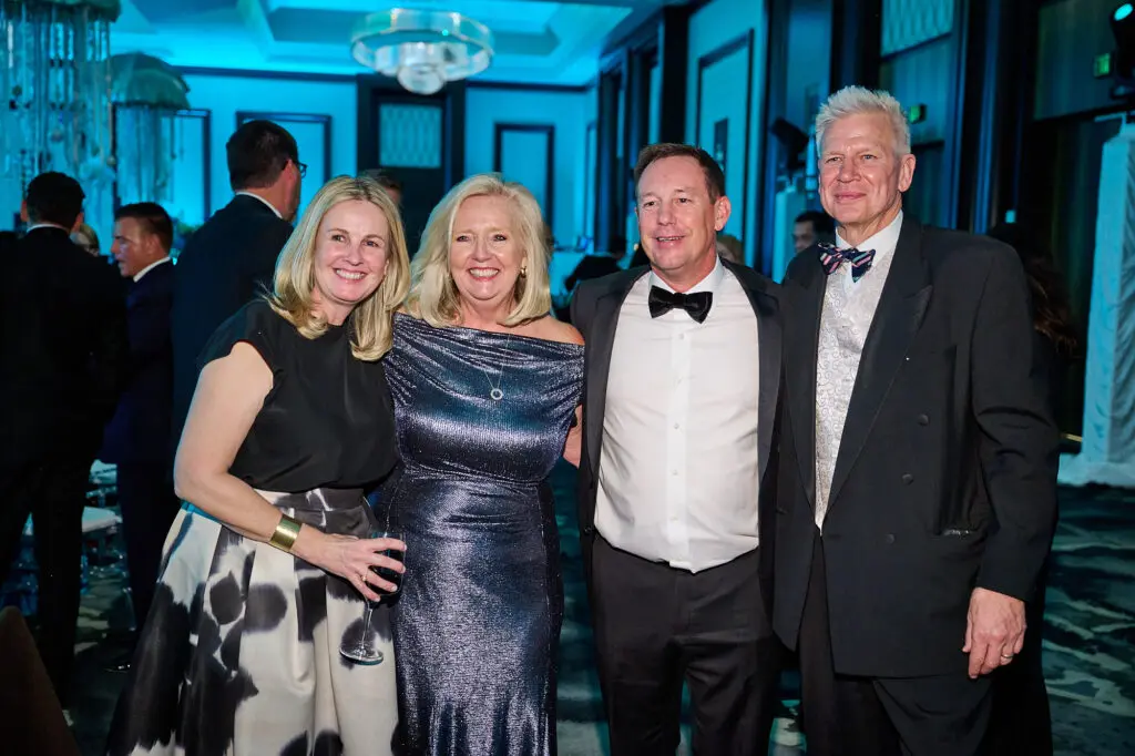Ann Adamson, Wendy King, Keelan Adamson, Warwick King at the Spindletop Community Impact Partners 50th annual Holiday Ball (Photo by Fulton Davenport/PWL Studio)