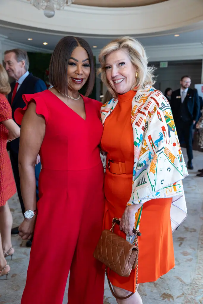 Emcee Deborah Duncan, Kathryn Smith  at the Salvation Army of Greater Houston 30th annual luncheon (Photo by Jenny Antill)