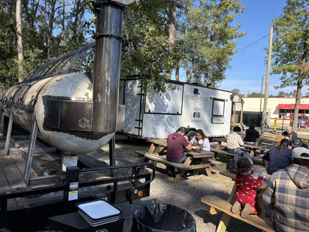 Plenty of picnic tables outside Rosemeyer Bar-B-Q's spot just off the Grand Parkway. It's open Thursday through Saturday from 11 a.m. to sellout. (Photo by Laura Landsbaum)