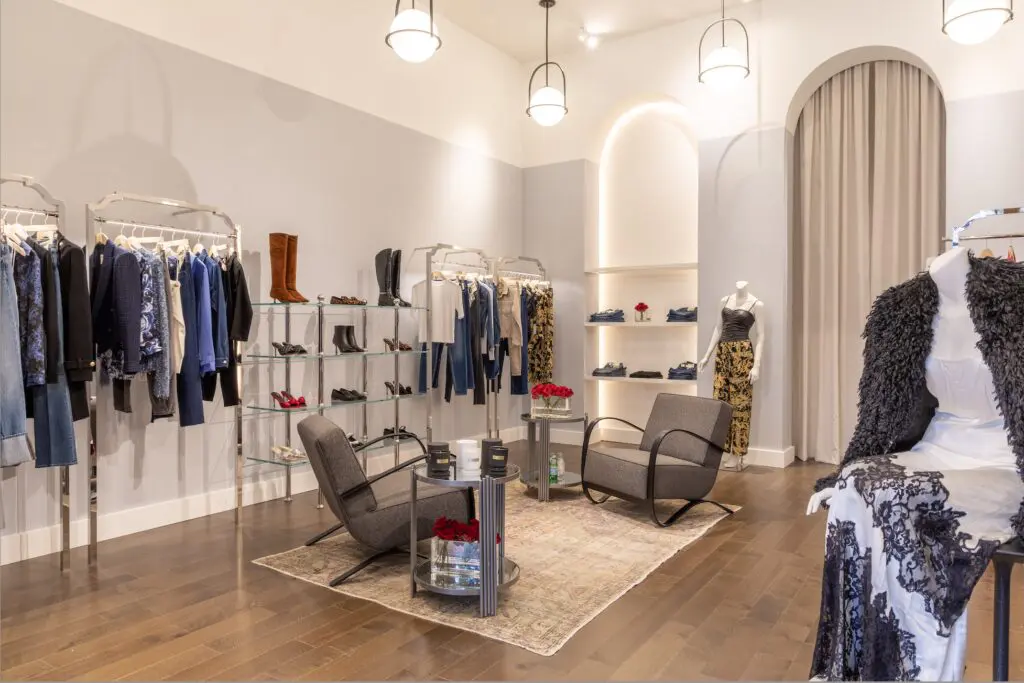 The new L’Agence boutique features a cozy sitting area.