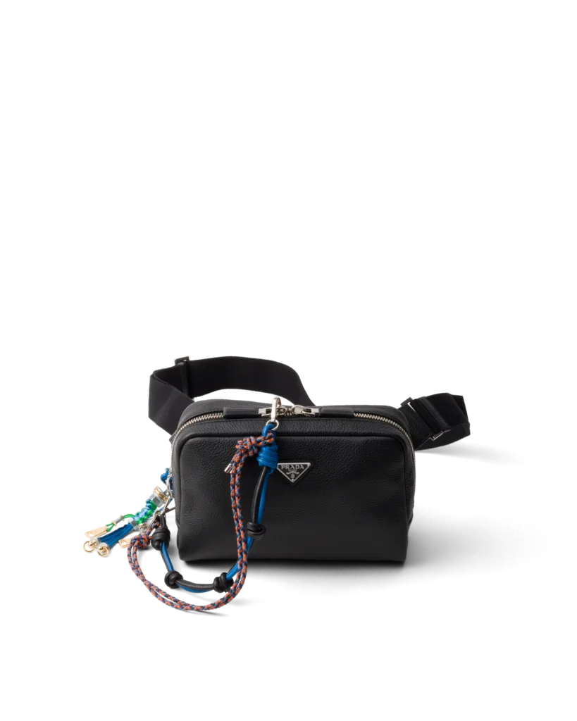 Prada leather shoulder bag with charm, 
$3,350, available at the Prada boutique.