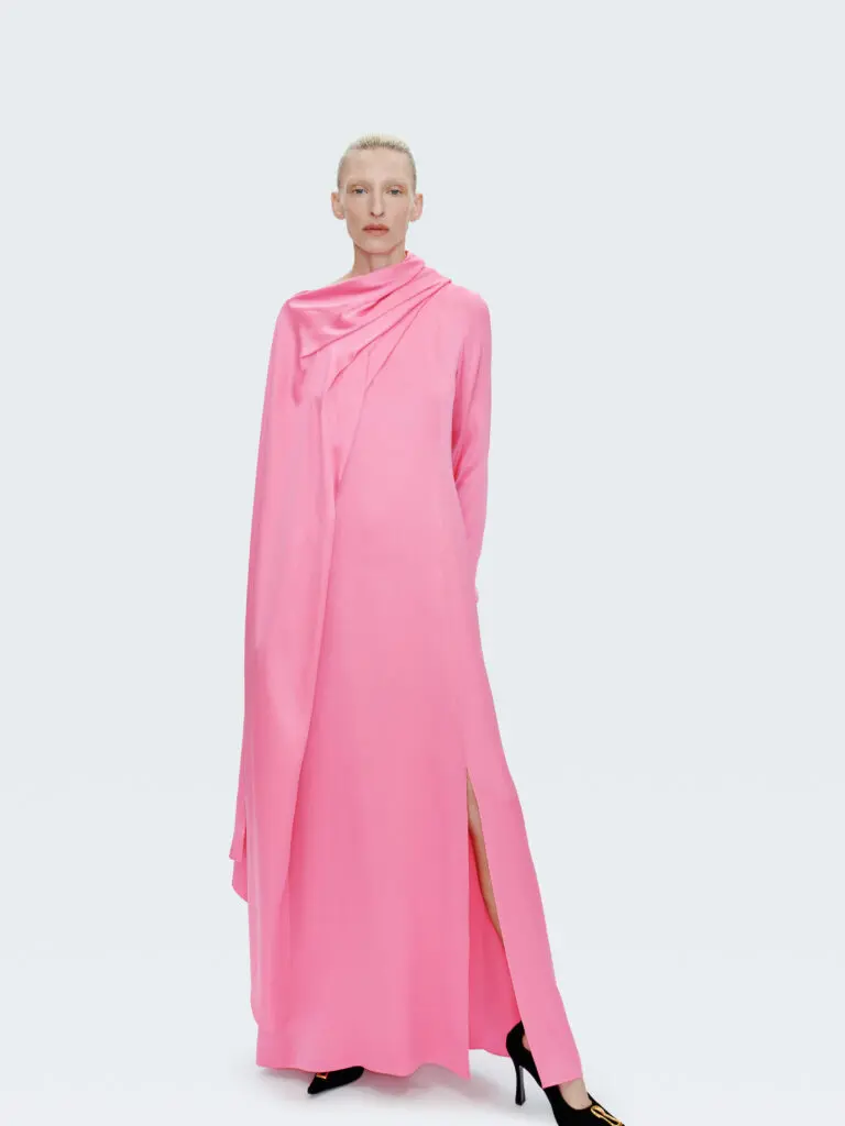 The capsule collection includes a "shocking pink" caped gown. (Courtesy of Schiaparelli)
