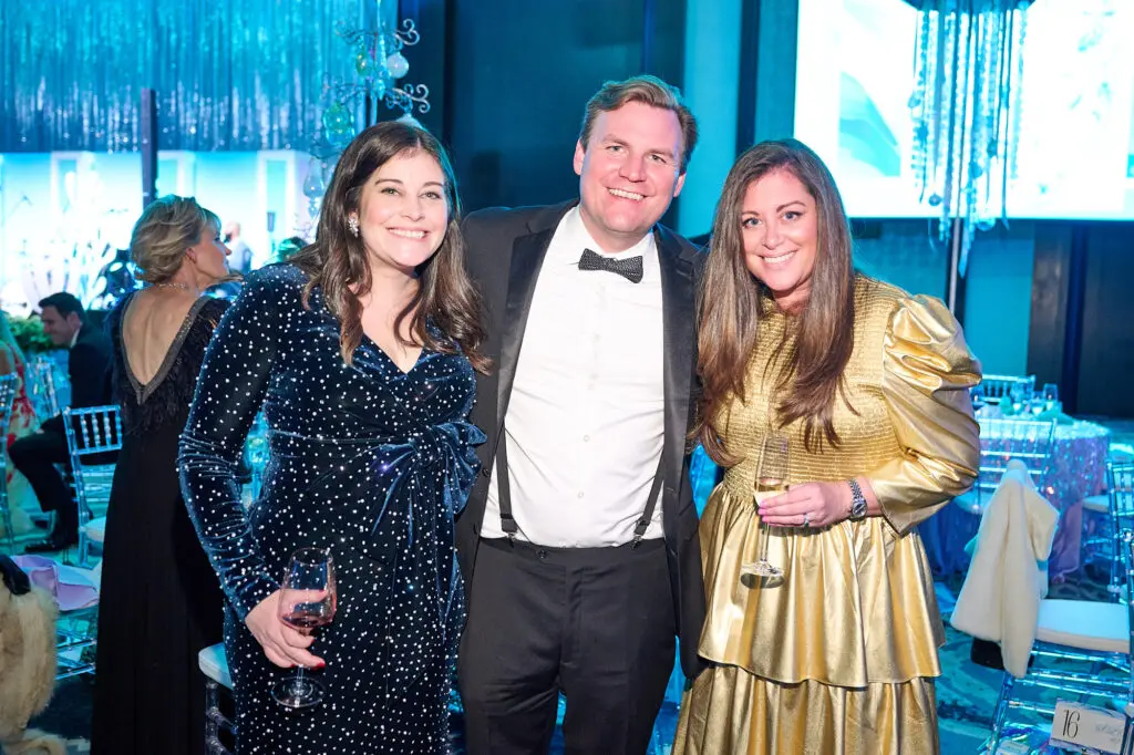 Sara & Ryan Young, Kerry Sedge at the Spindletop Community Impact Partners 50th annual Holiday Ball (Photo by Fulton Davenport/PWL Studio)