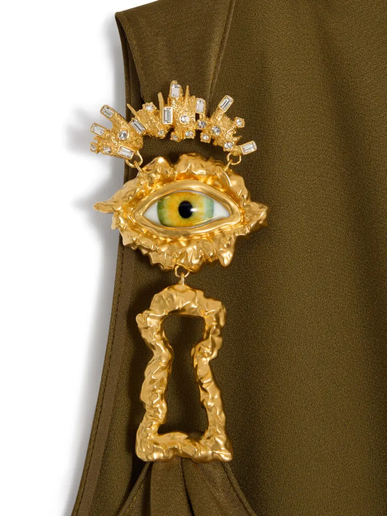 The evening gowns feature bijoux "codes" from the house, including the surrealist eye and keyhole. (Courtesy of Schiaparelli)