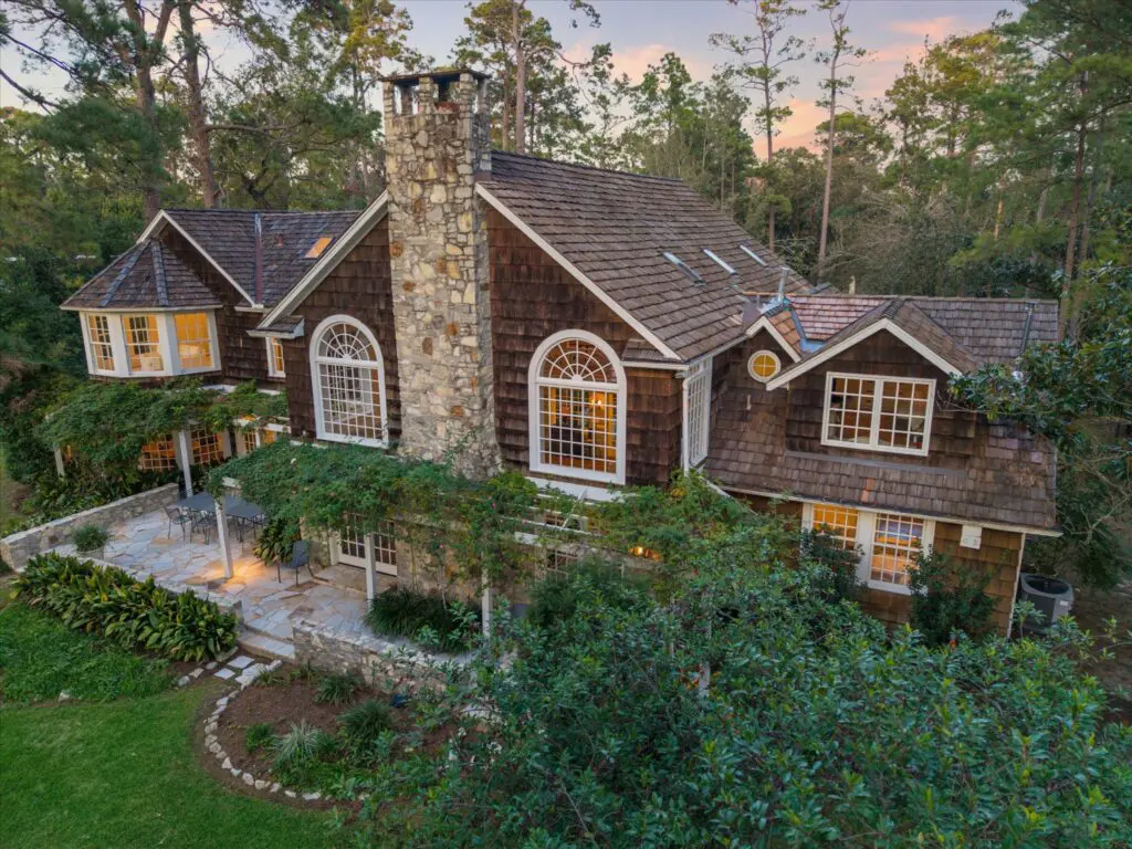  8899 Sandringham in Houston's Bayou Woods subdivision is a charming residence with 6,500 sq.ft. of living space (Photo by TK Images/Compass)