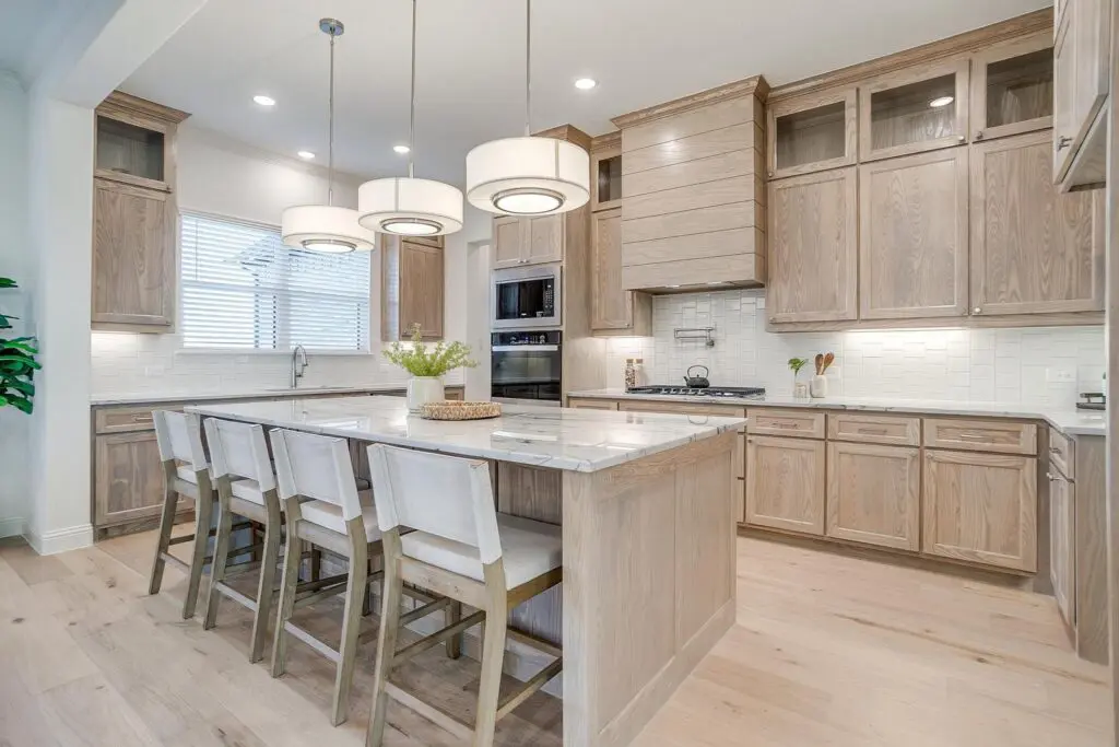 Ashton Theiss says homeowners are slowly moving away from “white-out” interiors in favor of 
Hill Country Modern aesthetics (shown here). (Courtesy Ashton Agency)