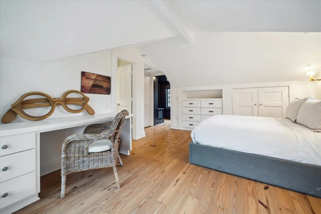 One of six bedrooms at 8899 Sandringham in Houston's Bayou Woods subdivision (Photo by TK Images/Compass)