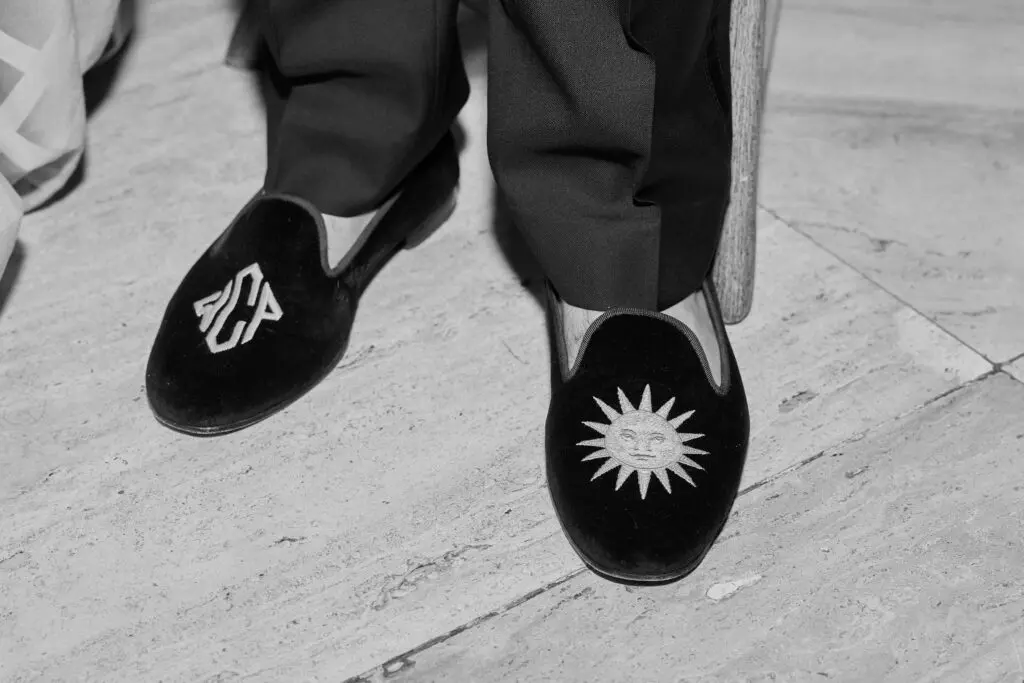 A popular shoe choice amongst the evening's most fashionable men? Velvet smoking slippers. (Photo by Nate Rehlander)